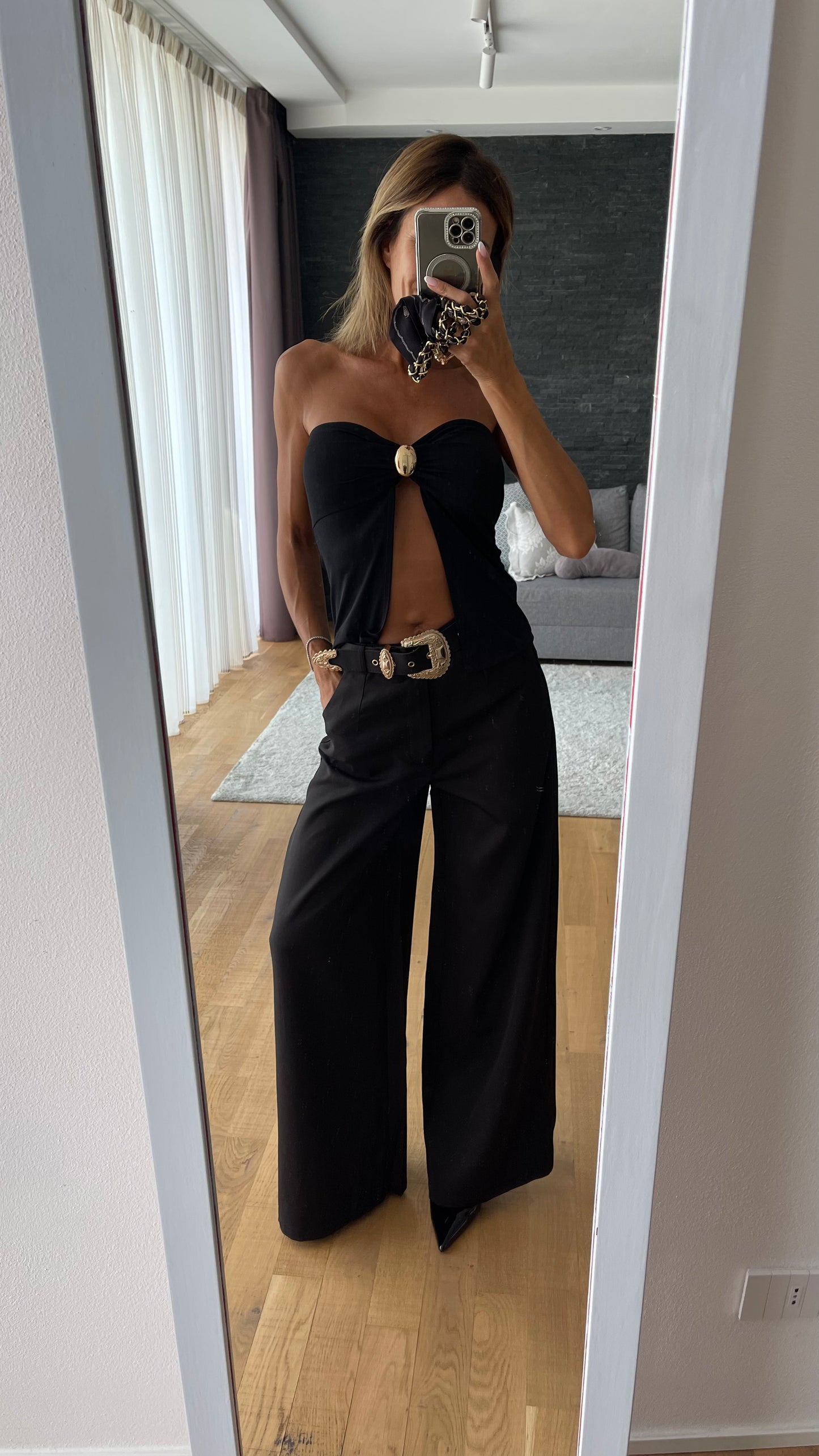 Pantalone palazzo vita alta cintura