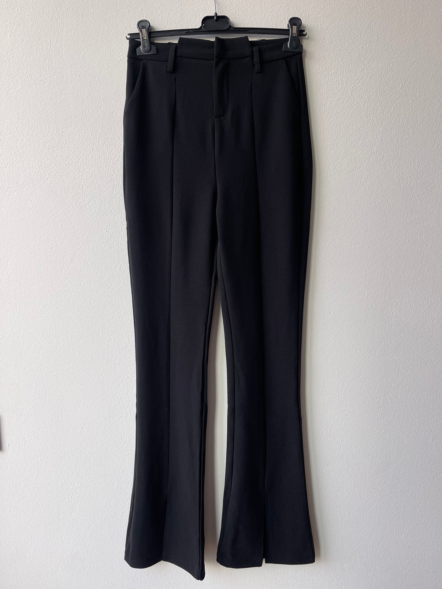 Black flare trousers with front slit