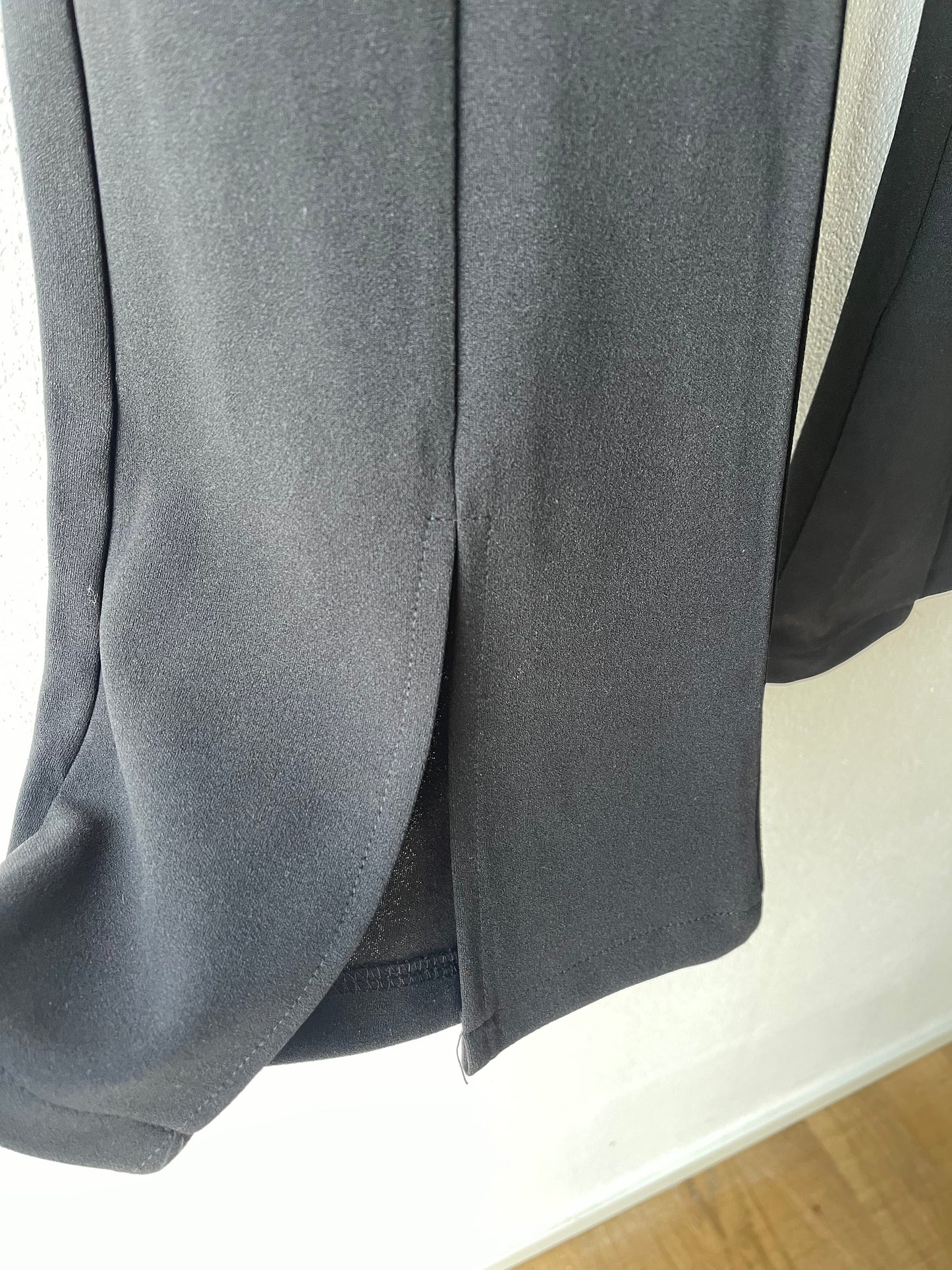 Black flare trousers with front slit