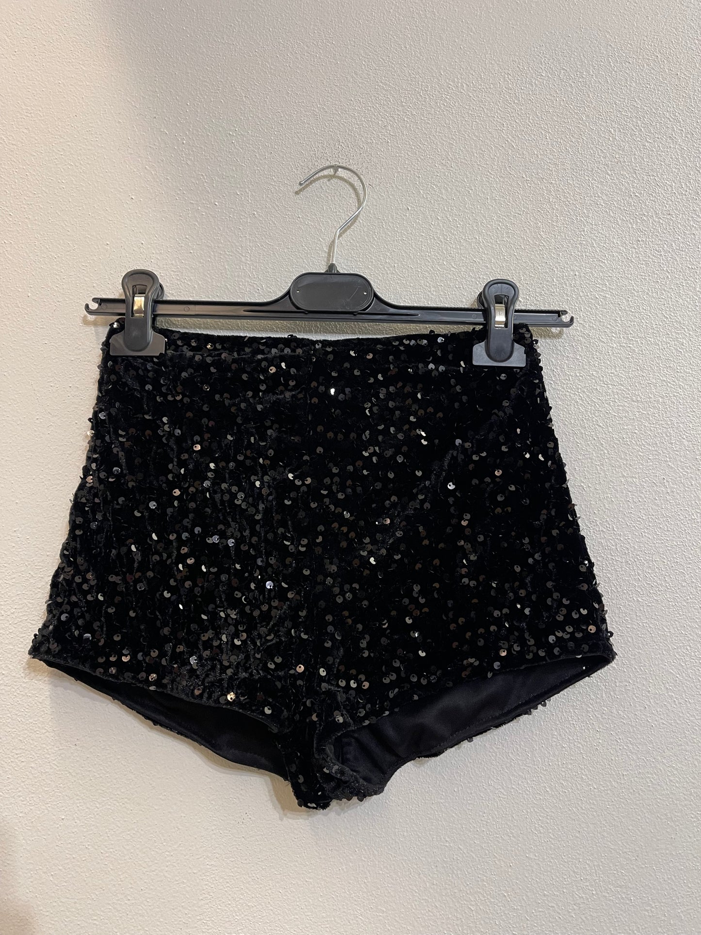 Shorts culotte con zip paillettes