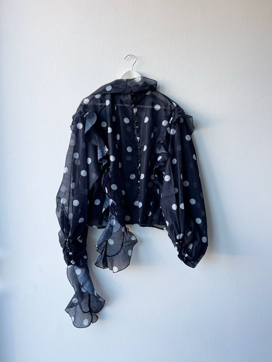 Black polka dot shirt