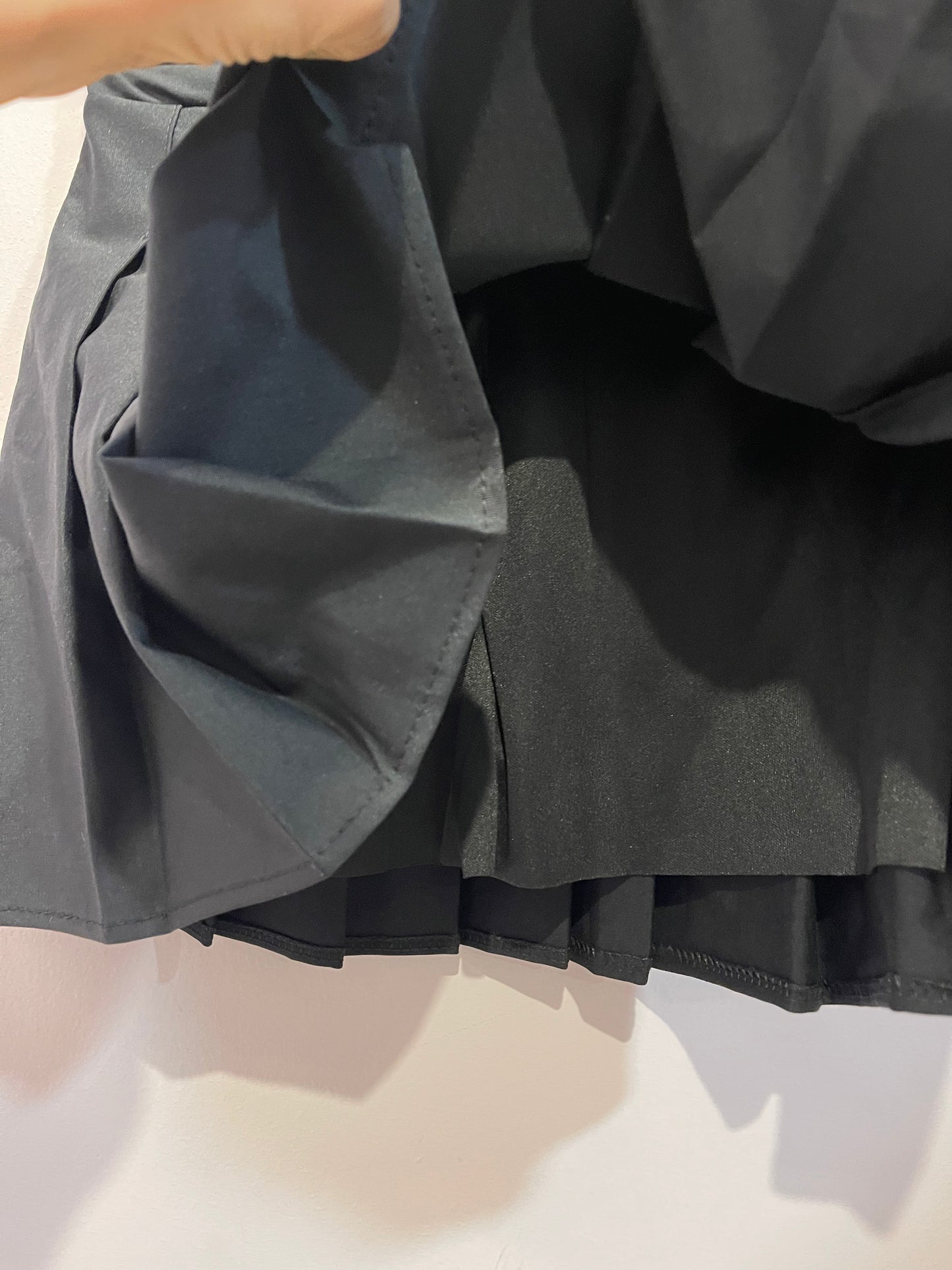 Black pleated skirt