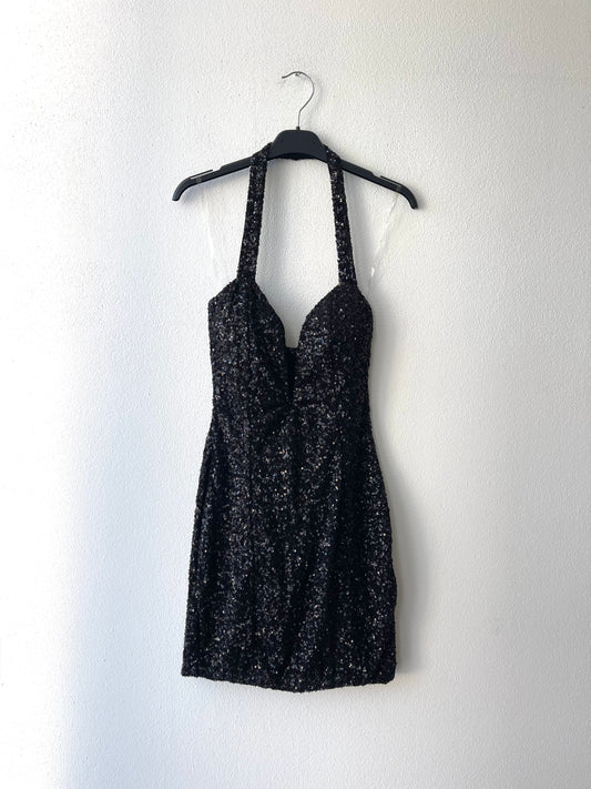 Abito paillettes con scollo profondo